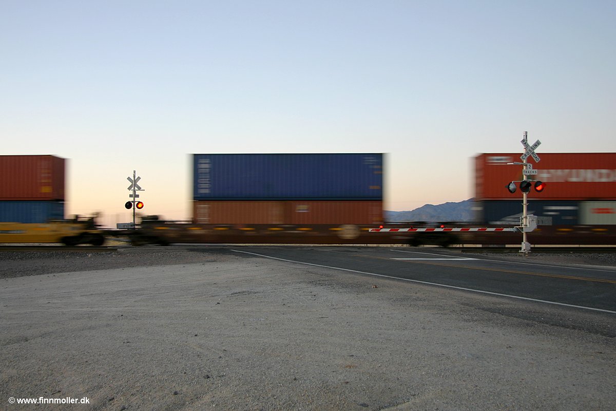 Containers cross highway 47
